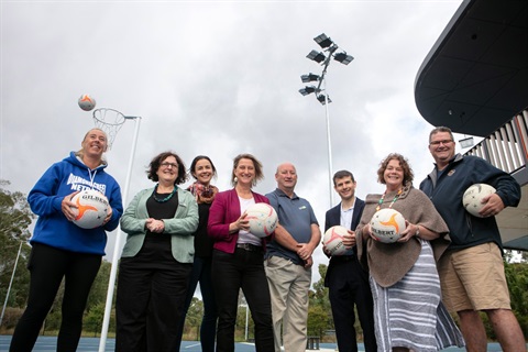 This is an image of Councillors, Vicki Ward MP and members of the Nillumbik Force Netball Association at the Diamond Creek Netball Courts.