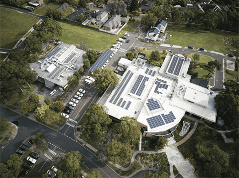 Aerial photo of the Council offices, showing many solar panels on the roof