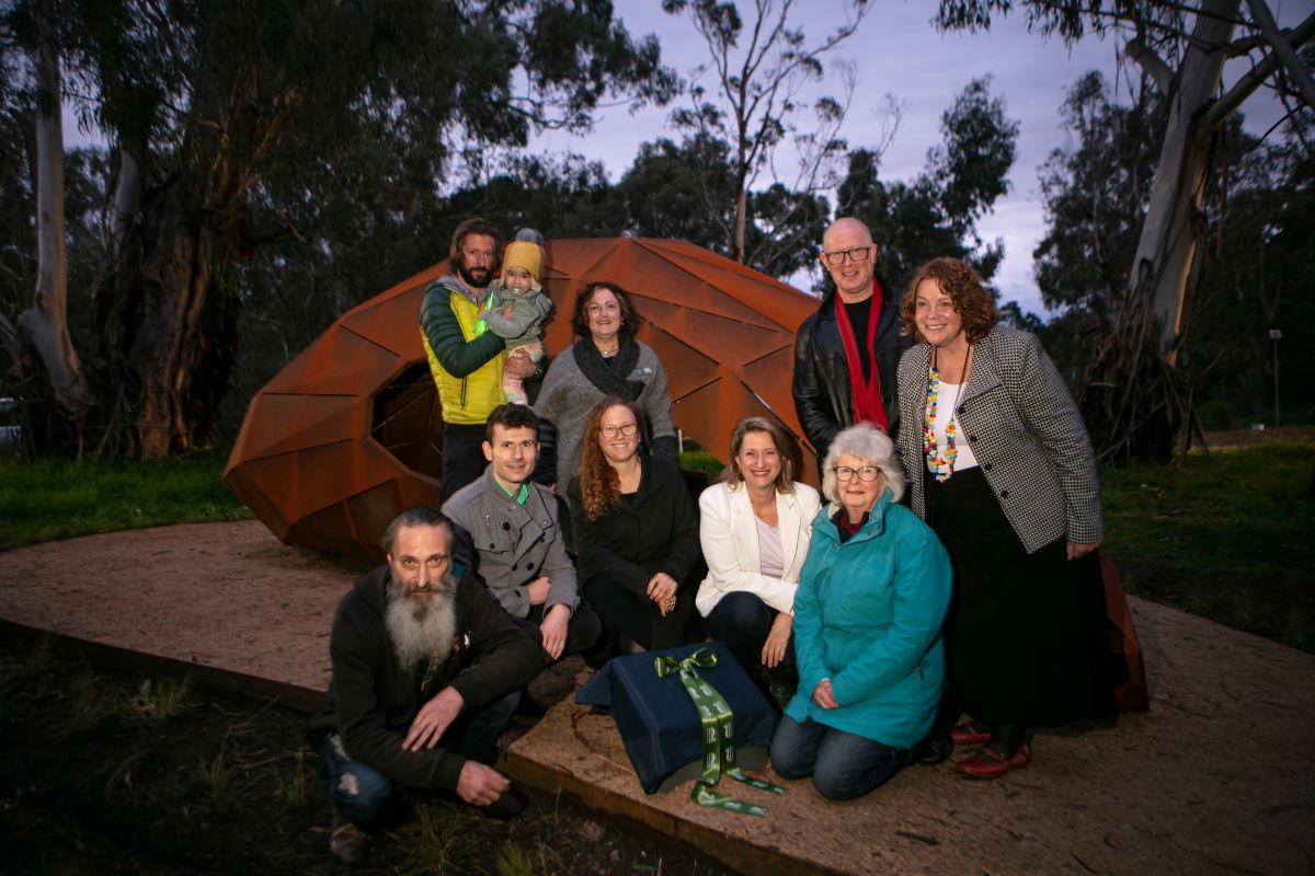 This is a photograph of the Mayor, Deputy Mayor, Councillors, Vicki Ward MP and the artist Maureen Faye-Chauhan in front of the Eltham Gateway sculpture.